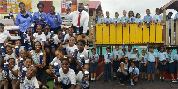 Sister Borgia School students posing with their sports water bottle along with their teachers, Miss Mature Norrisa Anatol and Mr. Norris Anatol from Spotless Cleaning Services who is a proud sponsor of this project and Sister Regina School students posing with their sports water bottle along with their teachers and Miss Mature Norrisa Anatol missmature30032017