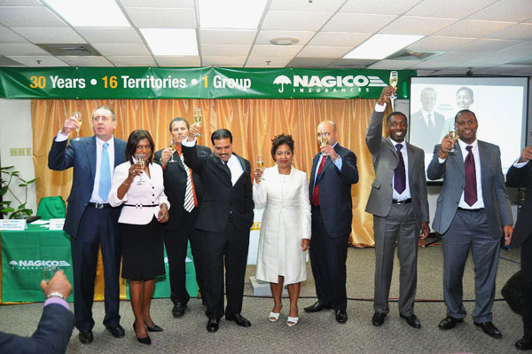 From left to right: Mr. Michael Bishop (Chairman of the Supervisory Board of NAGICO), Ms. Lisa Fulchan (Board Member NAGICO/GTM), Mr. Christopher Henriques (General Manager NAGICO/GTM), Mr. Imran McSood-Amjad (Group Chief Executive Officer, NAGICO), Mrs. Farina Amjad (Wife of Group CEO, NAGICO), Mr. Mark Teelucksingh (Board Member NAGICO/GTM), Mr. Glenville Blake (Director of Finance & Operations, NAGICO), and Mr. Vincent Haakmat (Director of Information Technology, NAGICO). (Chatter Photo) gtmnagicolaunchtrinidad23012012