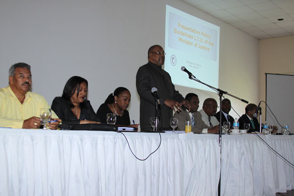 Minister of Justice Roland Duncan and his panel of workers that worked on the new LTU policy at the Belair Community Center Friday afternoon. justiceministryexplainingchangestoltupolicy06072012