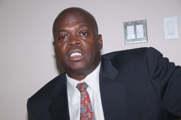 Member of Parliament Louis Laviest speaking to reporters on Tuesday. llaveist24012012