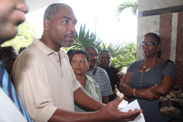 Workers of the Pelican Resort Club telling their story to the Dutch Members of Parliament and National Alliance Leader. pelicanworkerstalkingtomps12012012