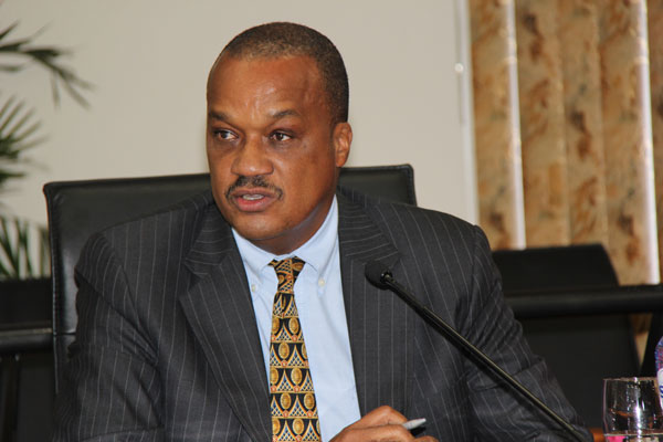 Minister of Finance Roland Tuitt at the Council of Ministers' weekly press briefing on Wednesday. rolandtuitt17102012