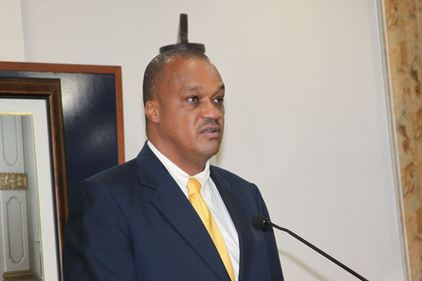 Minister of Finance Roland Tuitt at Wednesday’s Council of Ministers’ press briefing giving an update on his portfolio. rtuitt04072012