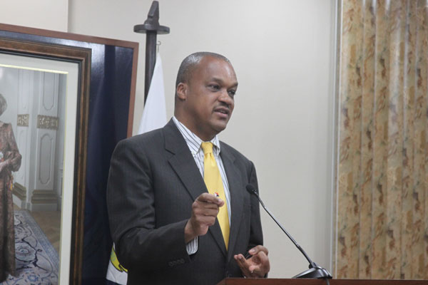 Finance Minister Roland Tuitt at the Council of Ministers' press briefing on Wednesday. rtuitt25072012