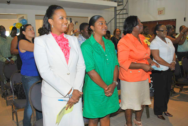 Left to right, Minister of Education Hon. Silveria Jacobs standing with MLK teachers. (DCOMM Photo) sjacobsatmlkschoolgraduation02072012