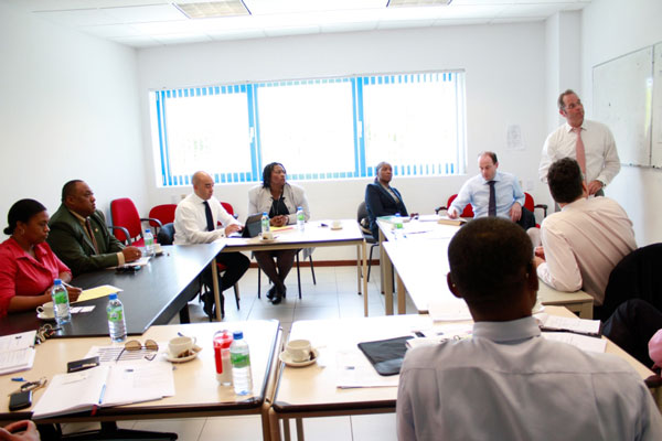 Minister of Finance Hon. Hiro Shigemoto sitting in on a presentation given by Taxand/A&M Taxand/VMW Taxand/Taxand Curacao to tax authorities on how to restructure the country’s tax system. (DCOMM File Photo) taxreformmeeting10012012