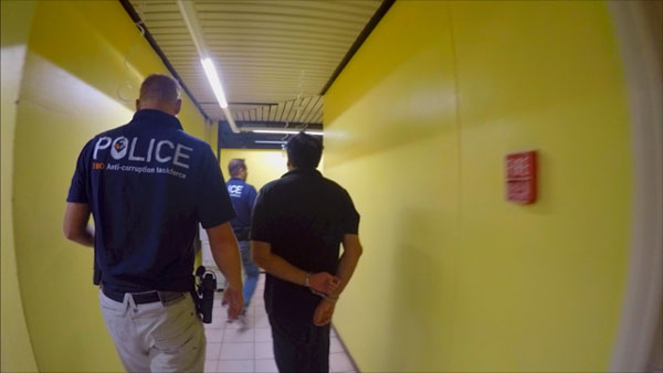 Francessco Corallo being led by police on Tuesday morning. franciscocorrallo13122016