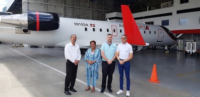 Head of Civil Aviation Louis Halley, TEATT Cabinet Senior Policy Advisor Ms Regina Labega, Tourism Minister for St. Maarten the honourable Stuart Johnson and Air Century Commercial Director Fabio Melo at the hanger of Air Century in the Dominican Republic. johnsonaircentury13052019