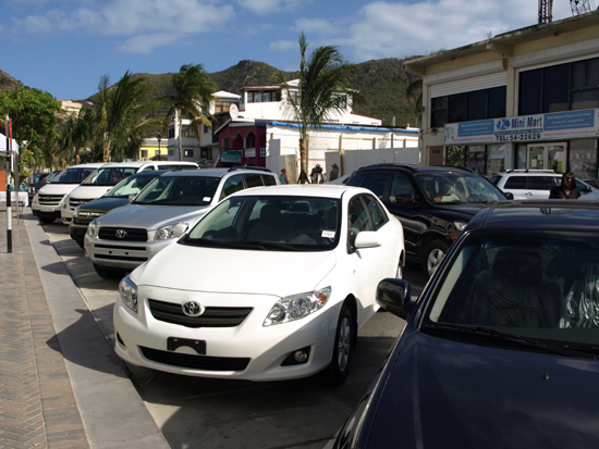 Some of the vehicles parked in front of police station for presentation ceremony. cars2