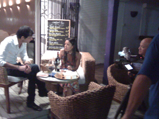 : Catando y Picando host, Bianca, discussing Wines & Cheeses with Guillerme Valade of Night Off, an establishment located at the Maho Complex. (Photo courtesy of the St. Maarten Tourist Bureau) catandoypicando