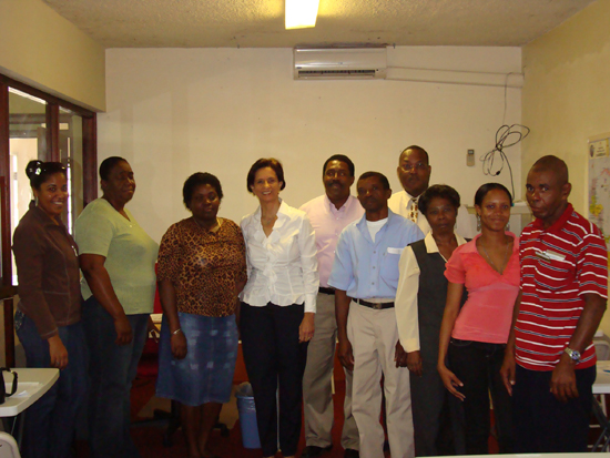 Left to right, Commissioner of Labour Sarah Wescot-Williams fourth from left followed by President of the WIFOL Theophilus Thompson, Head of the Labour Department Raphael Boasman (back row) and St. Maarten workers during the information session. commsww_wifollabourinformationsession