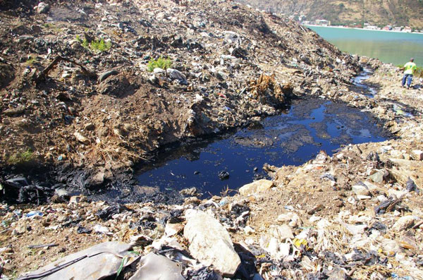 Dumping hole of waste oil on the landfill. dumpinghole17022011