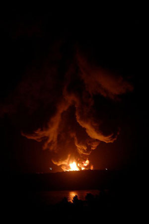 Fire Wednesday night at the Sanitary Landfill. (Photo by Vayolette Laguerre) fireondump02062011