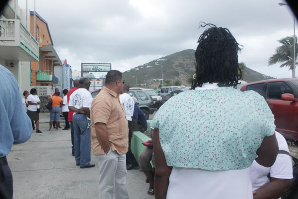 Senator Frans Richardson also shared the joy of Pelican workers on Tuesday. frichardsonwithworkers080220