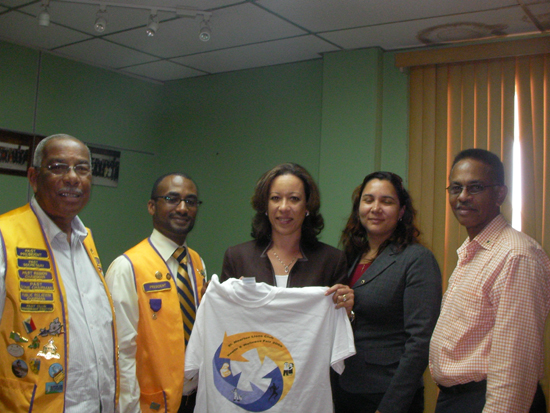 Left to right, Lion Wally Havertong, Chairman of the Health Committee St. Maarten Lion’s Club, Lion Richard Gibson Jr., President of the Lion’s Club, Commissioner Buncamper holding the T-Shirt presented by Gibson Jr., Lion Jessica Vrolijk and Lion Maxime Larmonie. lionsclubpresentation26