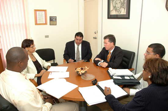 Left to right, Commissioner of Telecommunication and Aviation Affairs Sarah Wescot-Williams second from left and Antillean Minister of Telecommunications Maurice Adriaens seated fourth from left. meeting_sww_and_min_adriaens