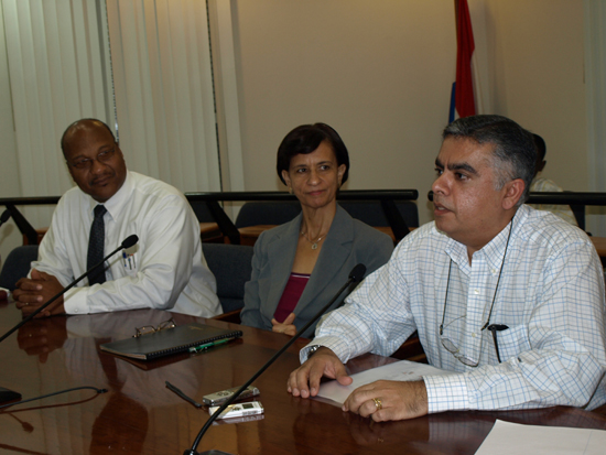 Quincy Harrigan, Commissioner of Education Sarah Wescot Williams and Director of Office World Naresh Daryanani. officeworld