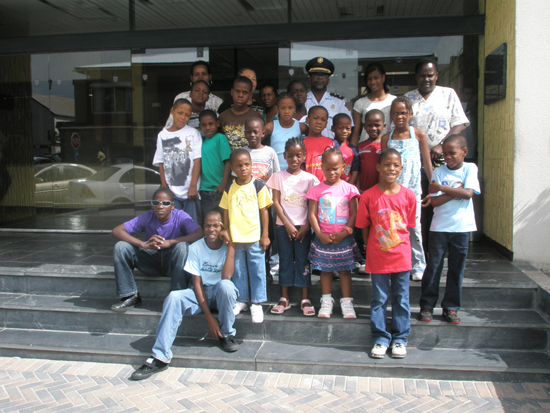 Inspector Ricardo Henson and IC children at Police Station. p2250005