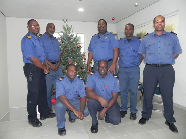 The recently promoted fire fighters. Standing from left to right: Marvin Dollison, Henry Duzanson, Clemente Jones, William York and Silvanico Pauletta. Kneeling are Kirk Richardson and Keith Fleming. Missing on the picture are Alberto Milton and Pedro Wilson. promotedfirefighters15022011
