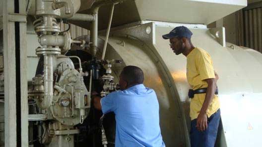 GEBE power plant Operations Chief, Kenrick Chittick, overseeing the investigation of the engine at the Cay Bay power plant. repairmangebe