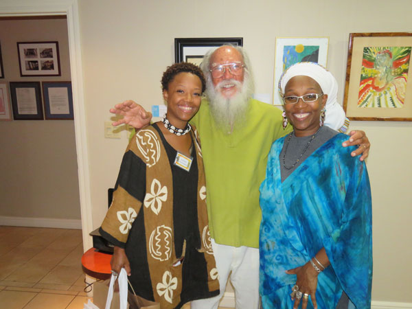 Sir Roland Richardson (C) with St. Croix spoken word artist AnuMaat Davis Kahina (L) and Dr. ChenziRa Davis Kahina, director of the Virgin Islands Caribbean Cultural Center, University of the Virgin Islands – guests at the St. Martin Book Fair’s “Book Covers Art Exhibition,” Sheer Restaurant gallery, Frontstreet (5.31.17). (Credit C. Davis-Kahina) rolandrichardson