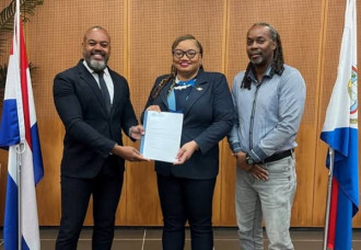 Minister of Finance, Marinka Gumbs, Receives Audited 2024 Annual Report from APS.