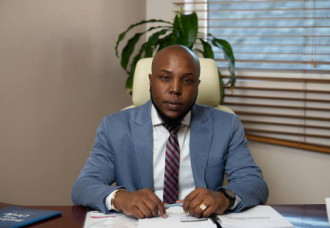 Doran Says Government Welcomes Private Investment for Docks but Blocks Schools.