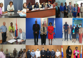 Minister Brug congratulates SG Arnell on 40 years of dedicated public service.