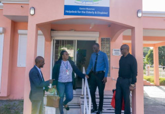 Minister Brug relocates his Cabinet outside of the Government Administration Building.