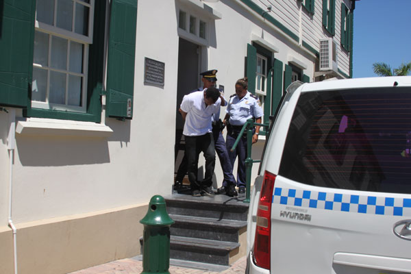 Meyshane Kemar Johnson leaving the Court of First Instance on Wednesday morning. meyshanejohnson03102012