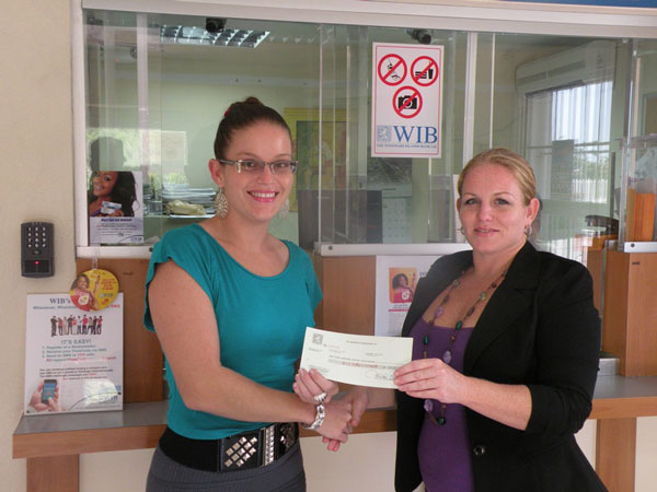 Left to right: Ms. Kelly Johnson & Maureen Kingsale. wibdonatestosabadanceschool12092012