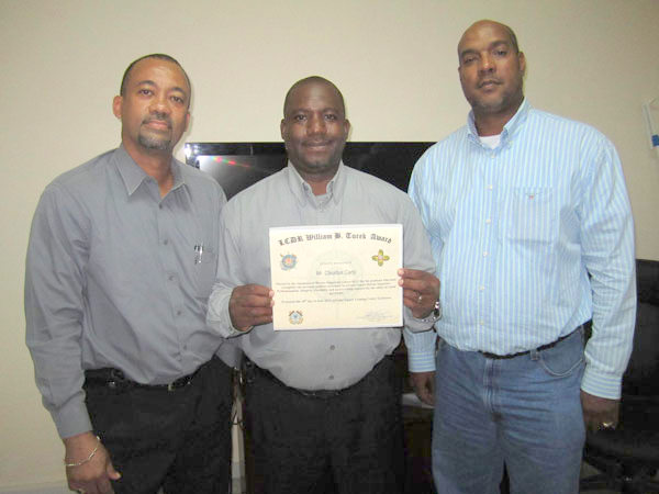 claudiuscartyreceivesawardafteruscoastguardmarineinspectorcourse16072013