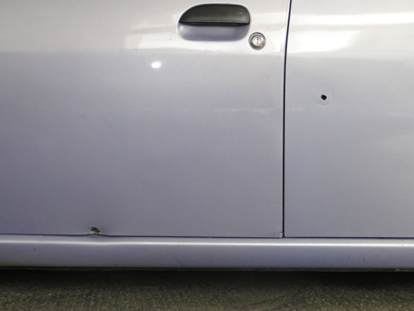 lavendercarwithbulletholes29072013