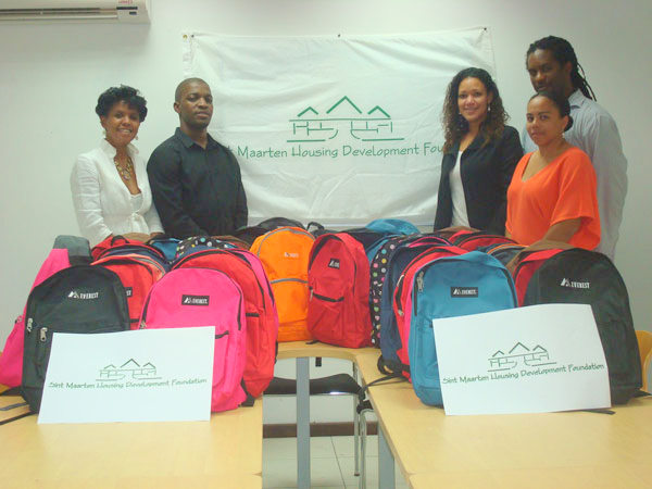 smhdfdonatesschoolsuppliestotenants04082013