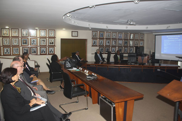 swescotwilliamsreceivespresentationfromcentralbank26072013