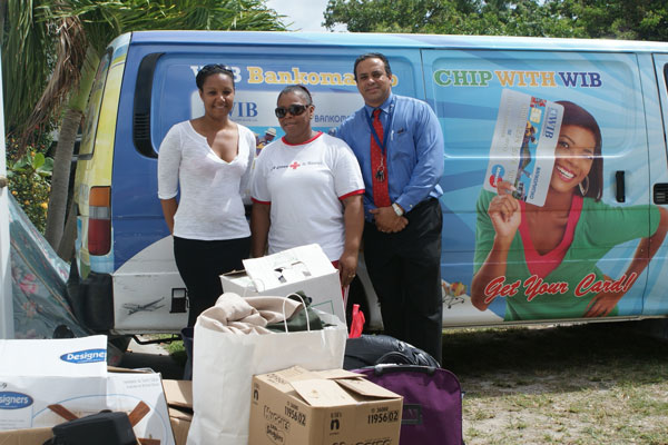 wibemployeesdonatetofirevictims04112013