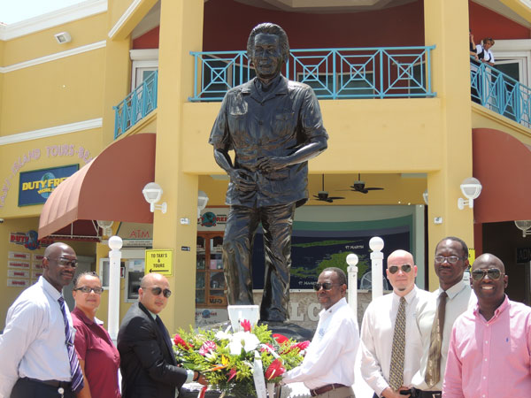 wreathlayingatclaudewatheystatueatportofsxm28072013
