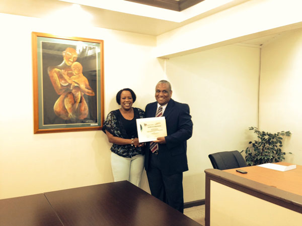 malvinathomasiareceivesherbandpcertificate03062014