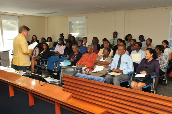 With back to the camera, De Groot discusses protocol with workshop attendees. (DCOMM Photo) protocolworkshop31102011